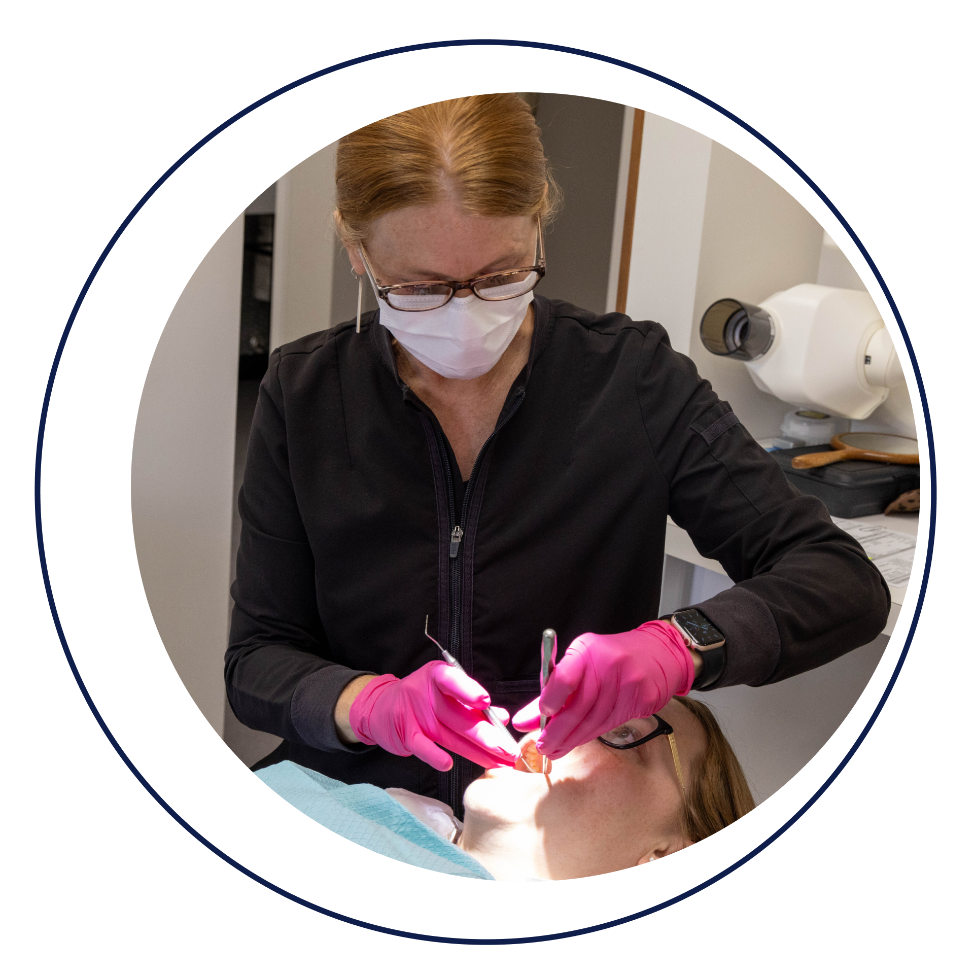 assistant performing dental procedure on patient